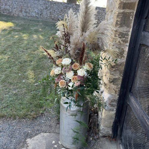 milk churn ourside church